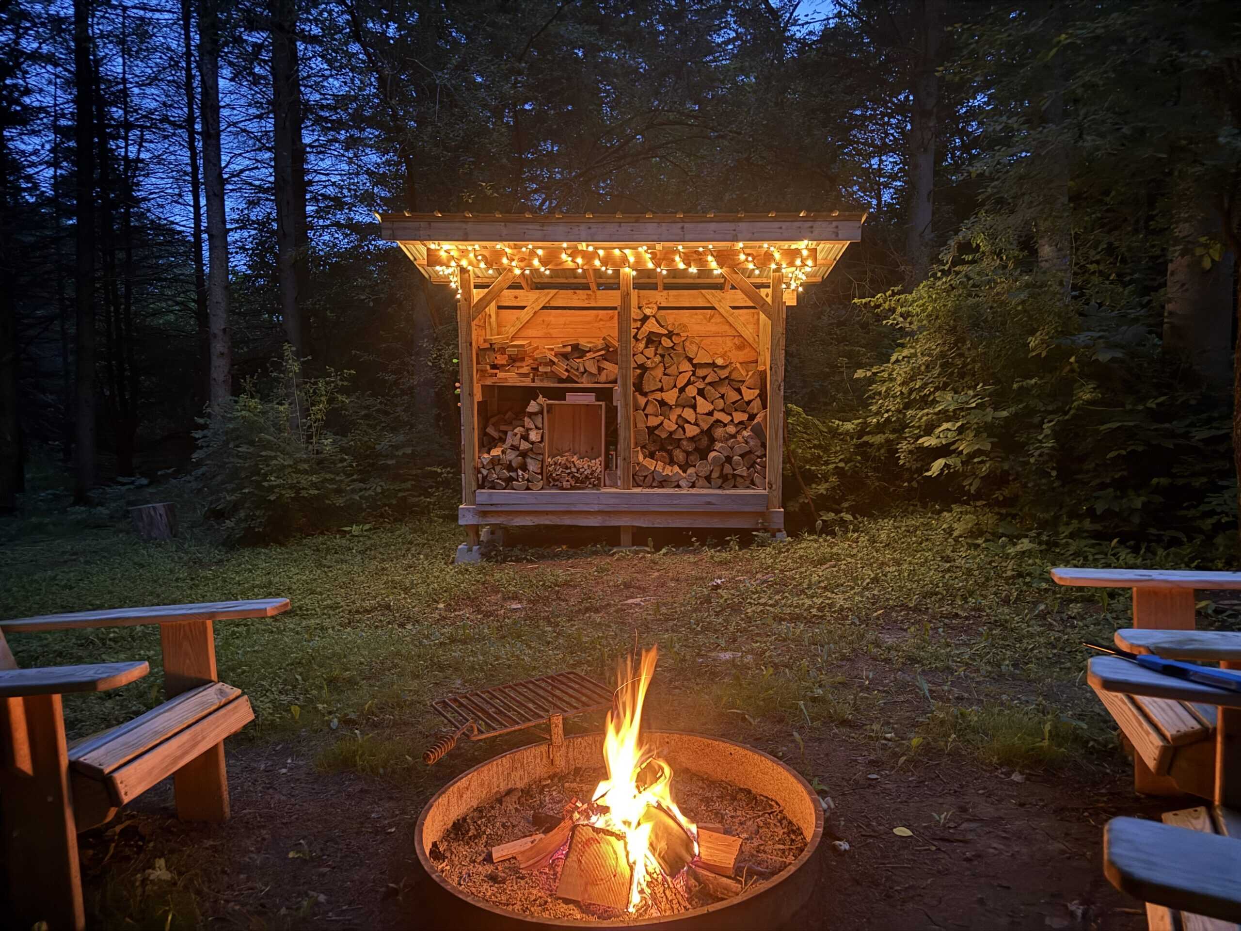 How a Woodshed Built From Spare Materials Can Radically Improve Your Fire Pit Setup